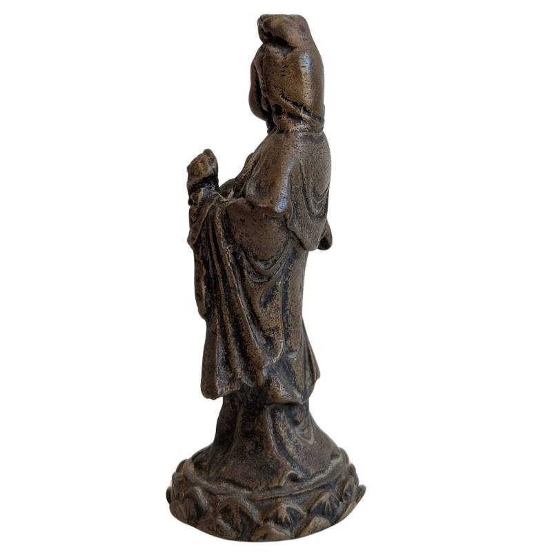 Weathered Guanyin travel statue in bronze with soft wear