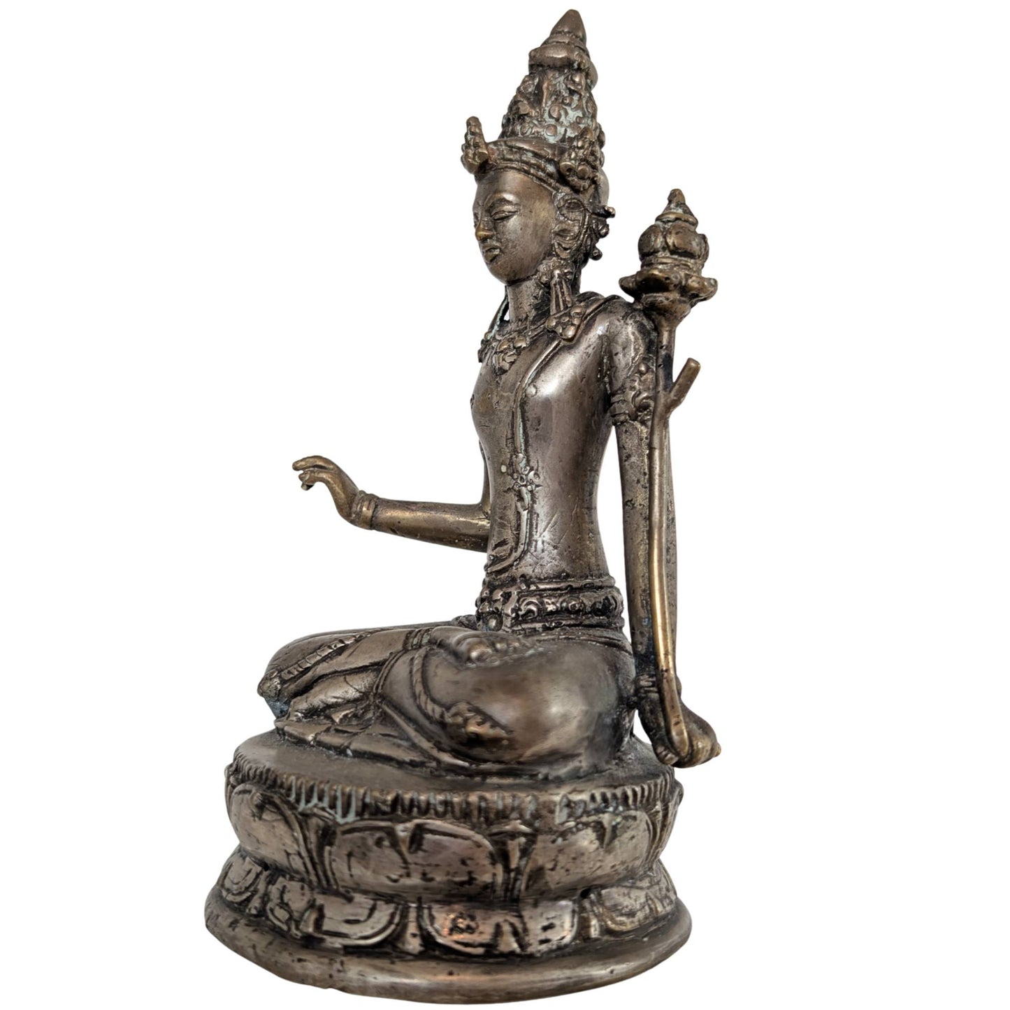 Detail of the face shows the silvery patina and the meditative expression.
