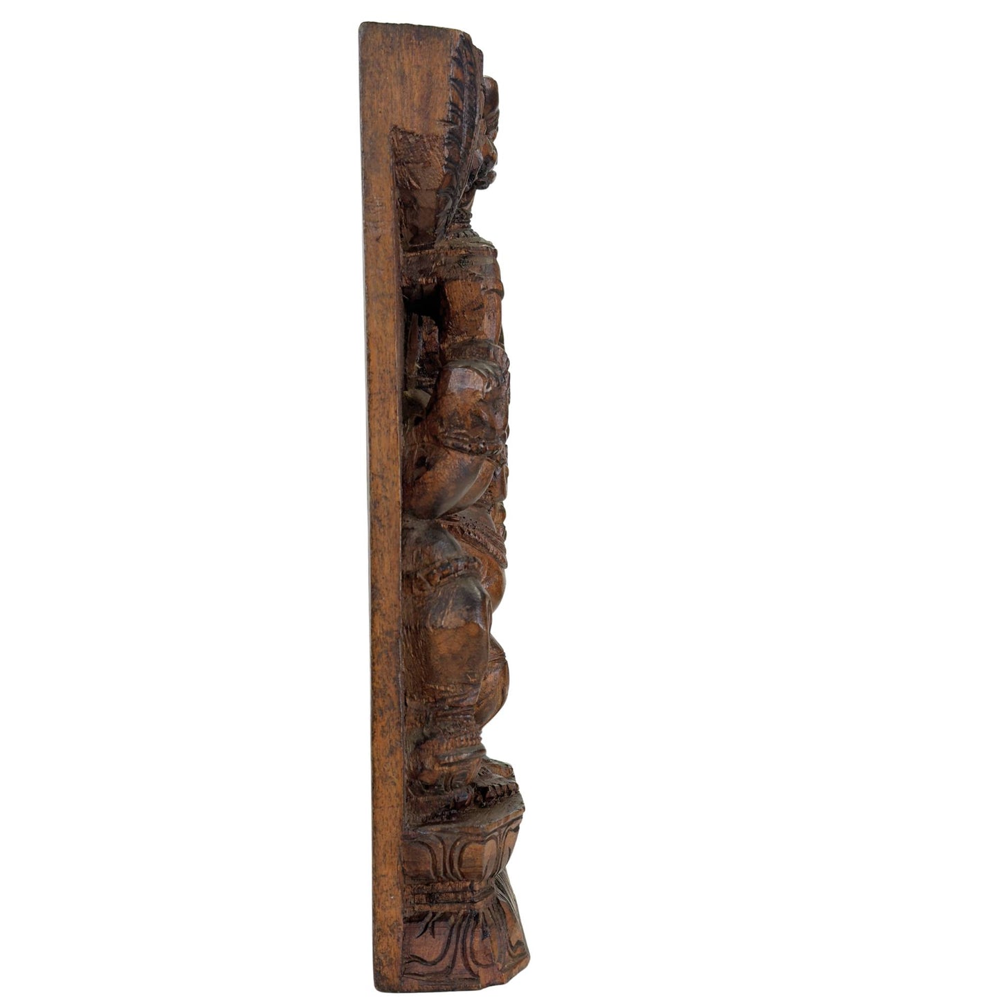 Hand-carved wooden Ganesha as a wall relief with rich details
