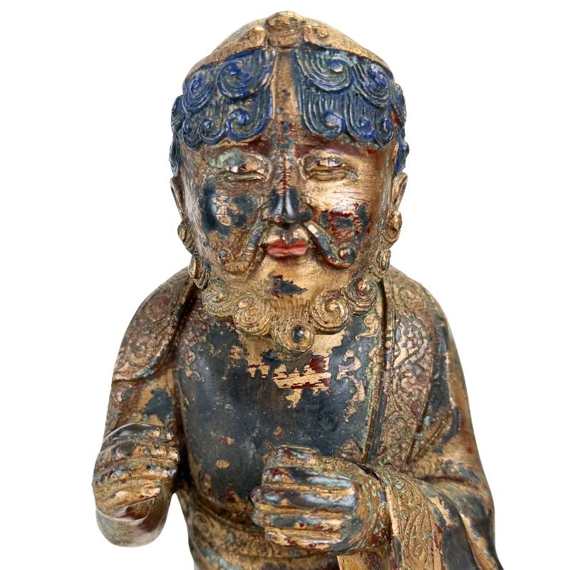 Himalayan Arhat figure on a buffalo in bronze version
