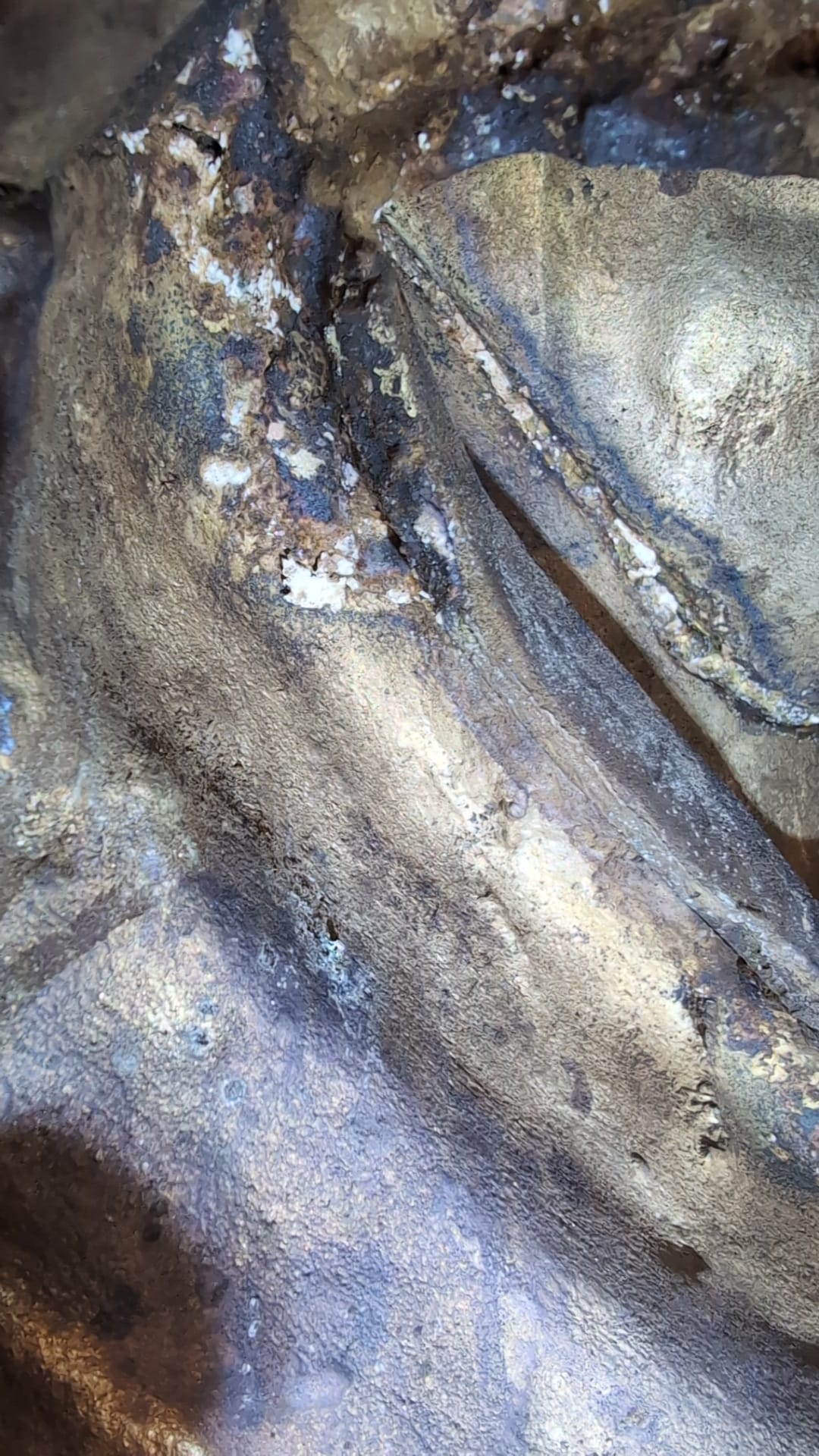 Antique Himalayan bronze Buddha with a deeply aged surface