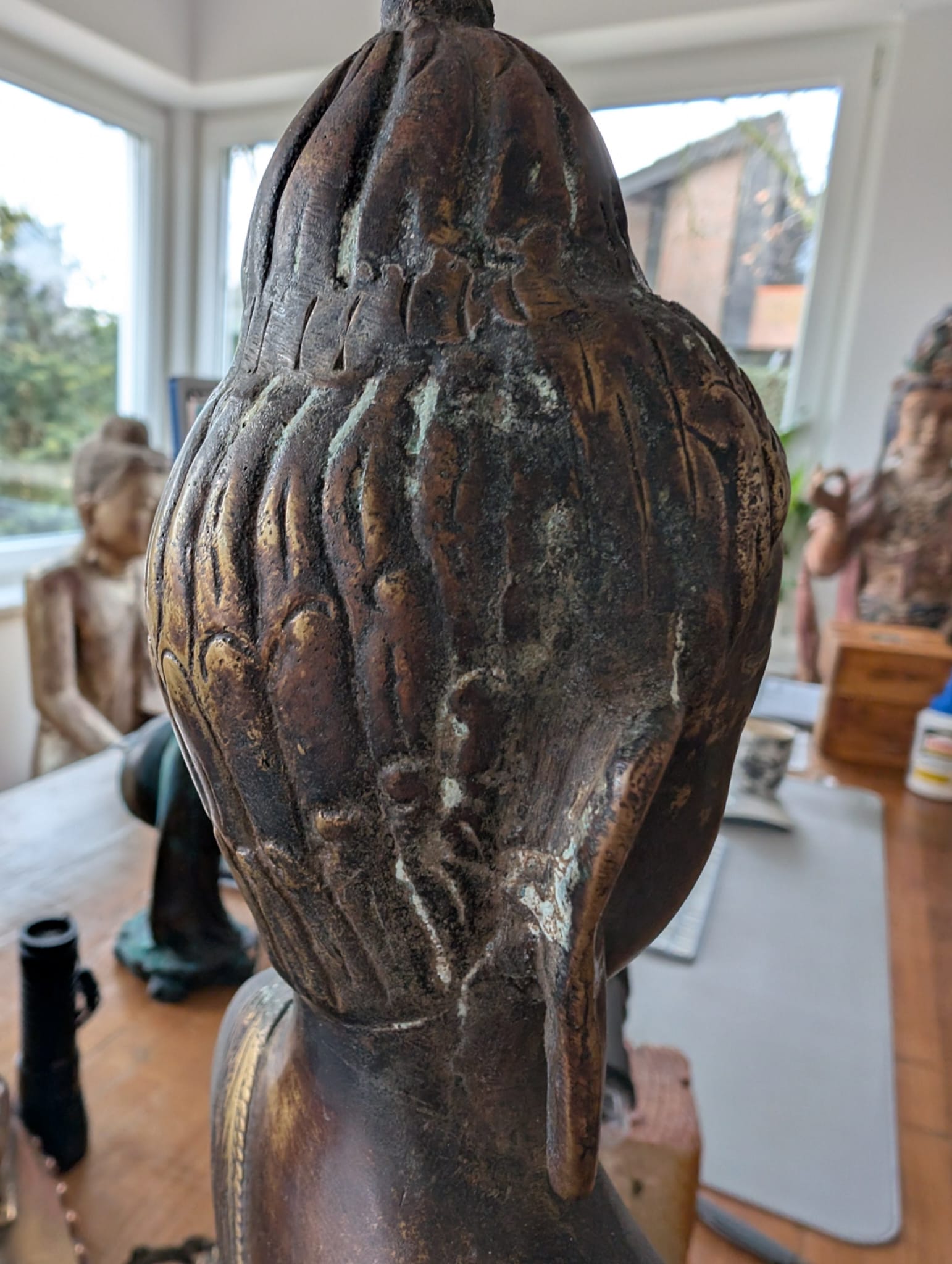 Antique Himalayan bronze Buddha with mineralization and aging
