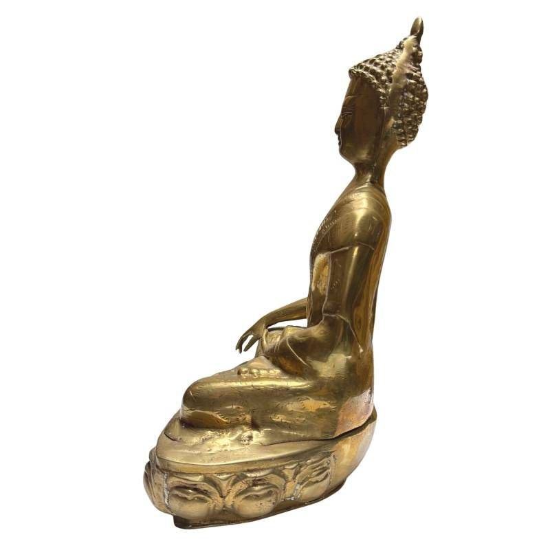 Antique Himalayan Buddha of fire-gilded bronze on a lotus base