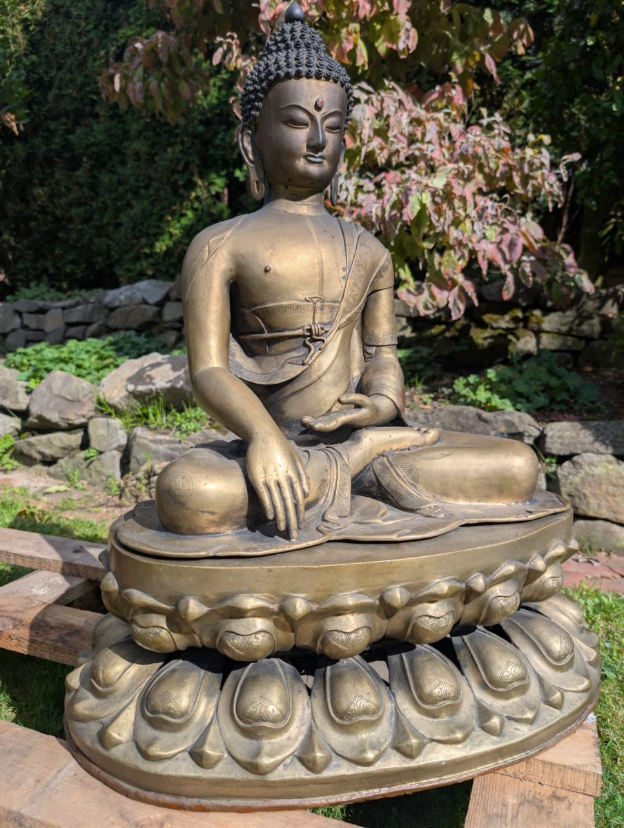 Bronze Himalayan Buddha statue with complete temple set and patina