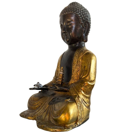 Himalayan bronze Buddha with gilding and stupa detail in meditation pose