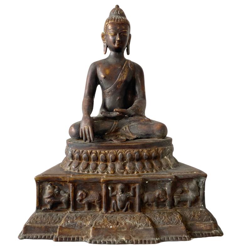 Himalayan bronze Buddha with storytelling throne, fire gilding and deep patina, seated in dhyana mudra