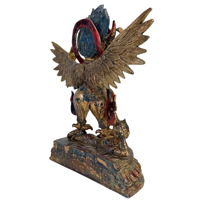Himalayan Garuda statue in gilded bronze with ritual symbolism