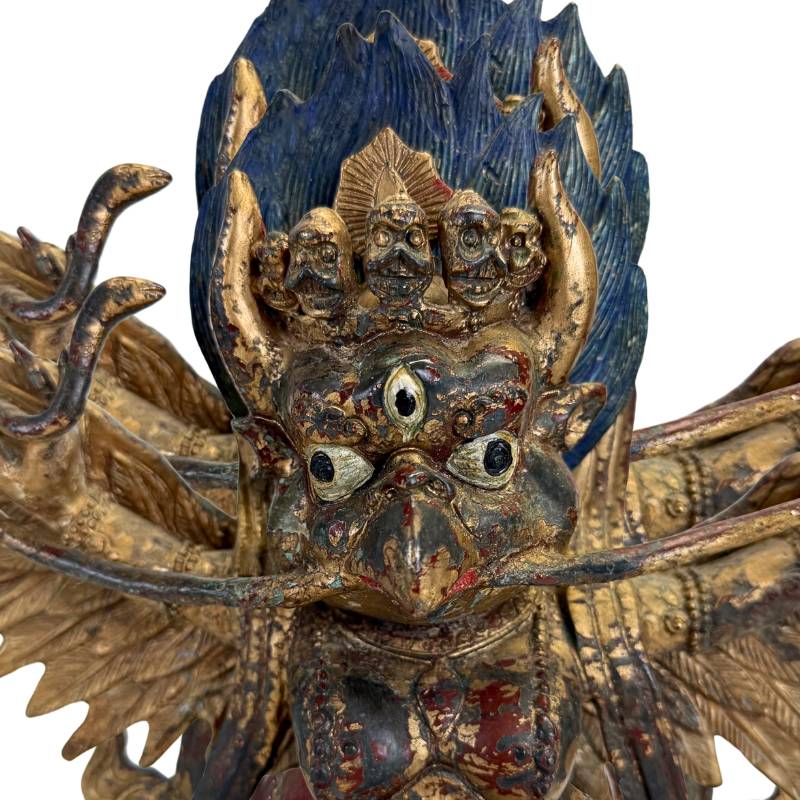 Himalayan Garuda figure with ritual aura in bronze