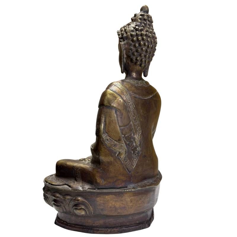 Antique bronze Medicine Buddha as a timeless interior statue