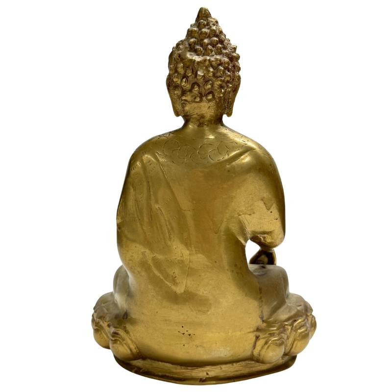 Hand-engraved bronze Buddha statue in Himalayan style with detailed decorations.