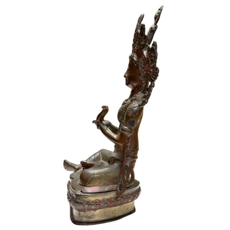 Seated antique Tara from the Himalayan tradition with a harmonious appearance