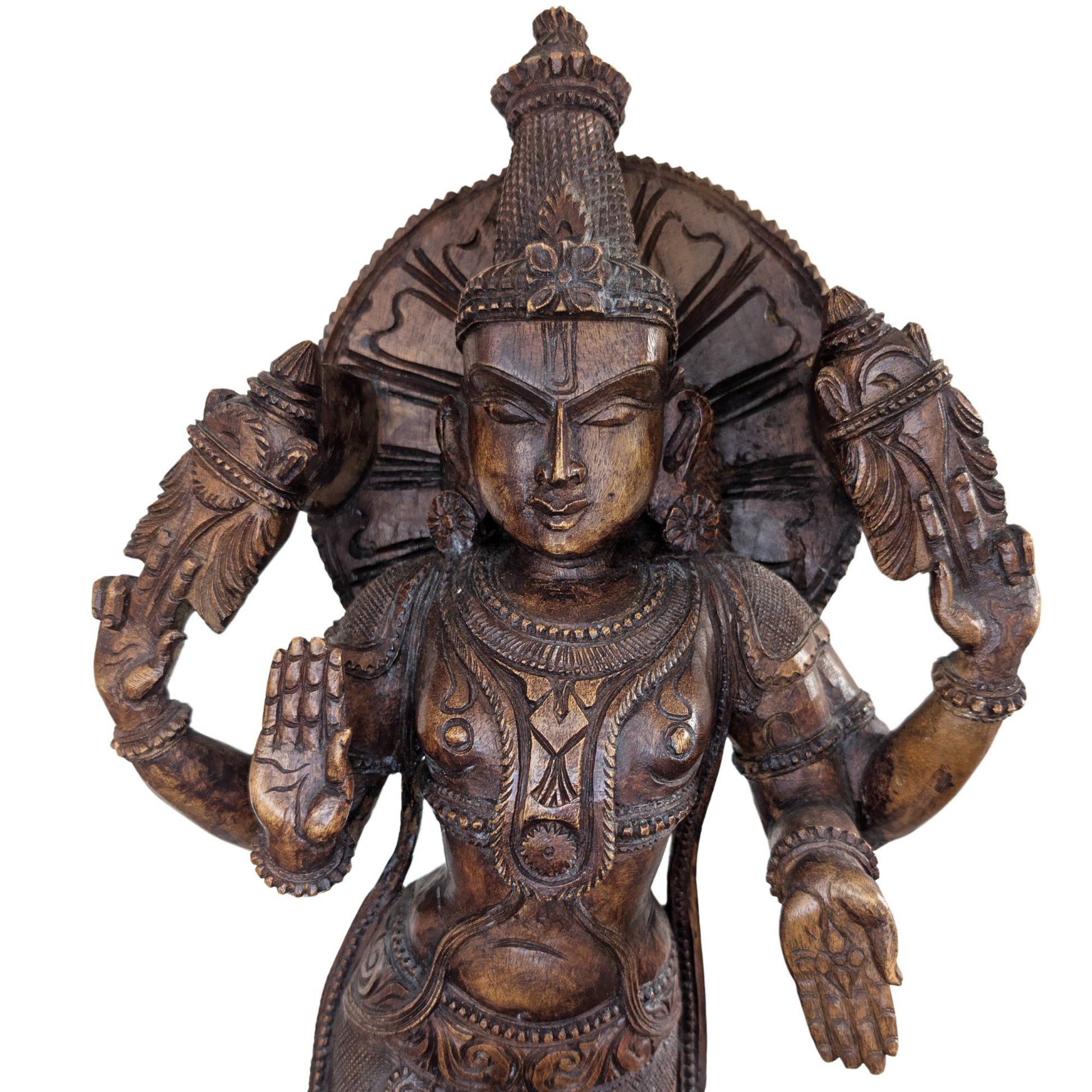 Spiritual wooden statue of Vishnu for home altar or interior.