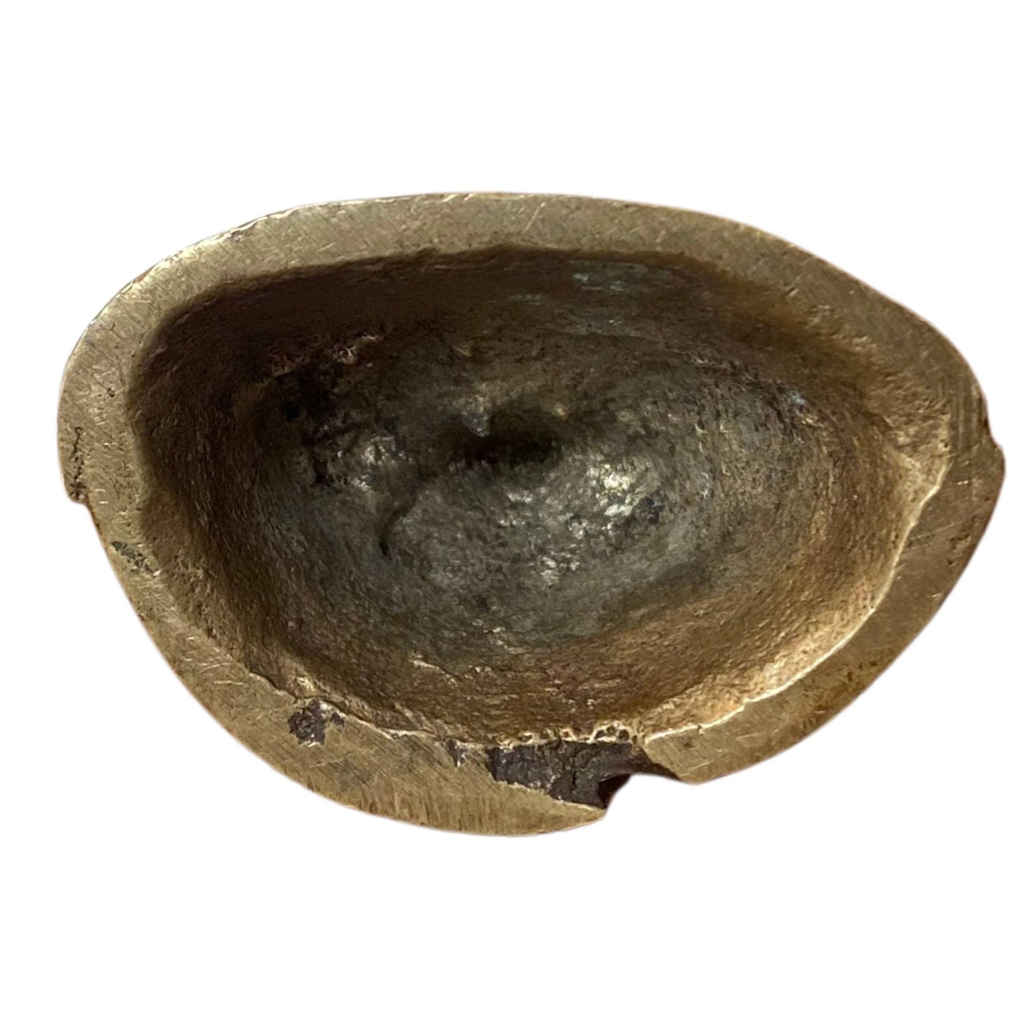 The underside shows the rough casting cavity, characteristic of authentic 19th-century Himalayan sculptures.