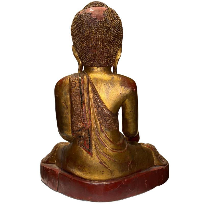 Wooden Buddha statue in an earth-touching posture with classic Mandalay design