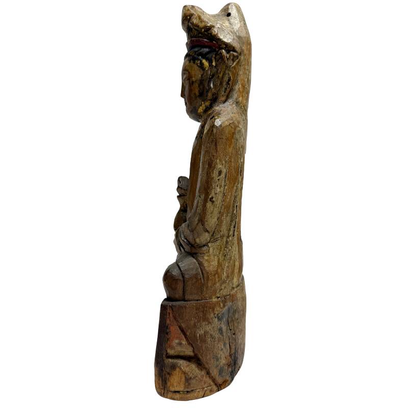 Hand-carved wooden Guanyin statue with soft forms and old patina