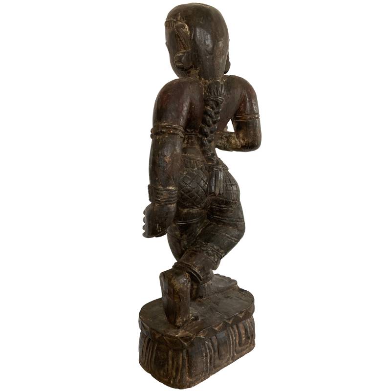 wooden lakshmi sculpture Nepal old paint residue detail