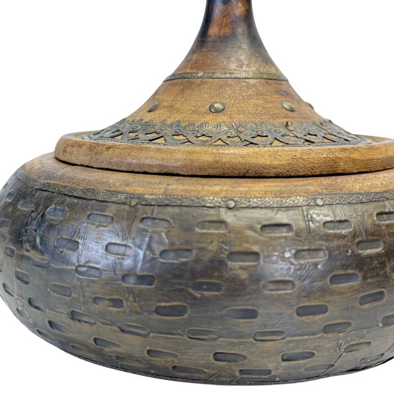 Wooden storage jar with metal inlay and geometric decoration in Moroccan style