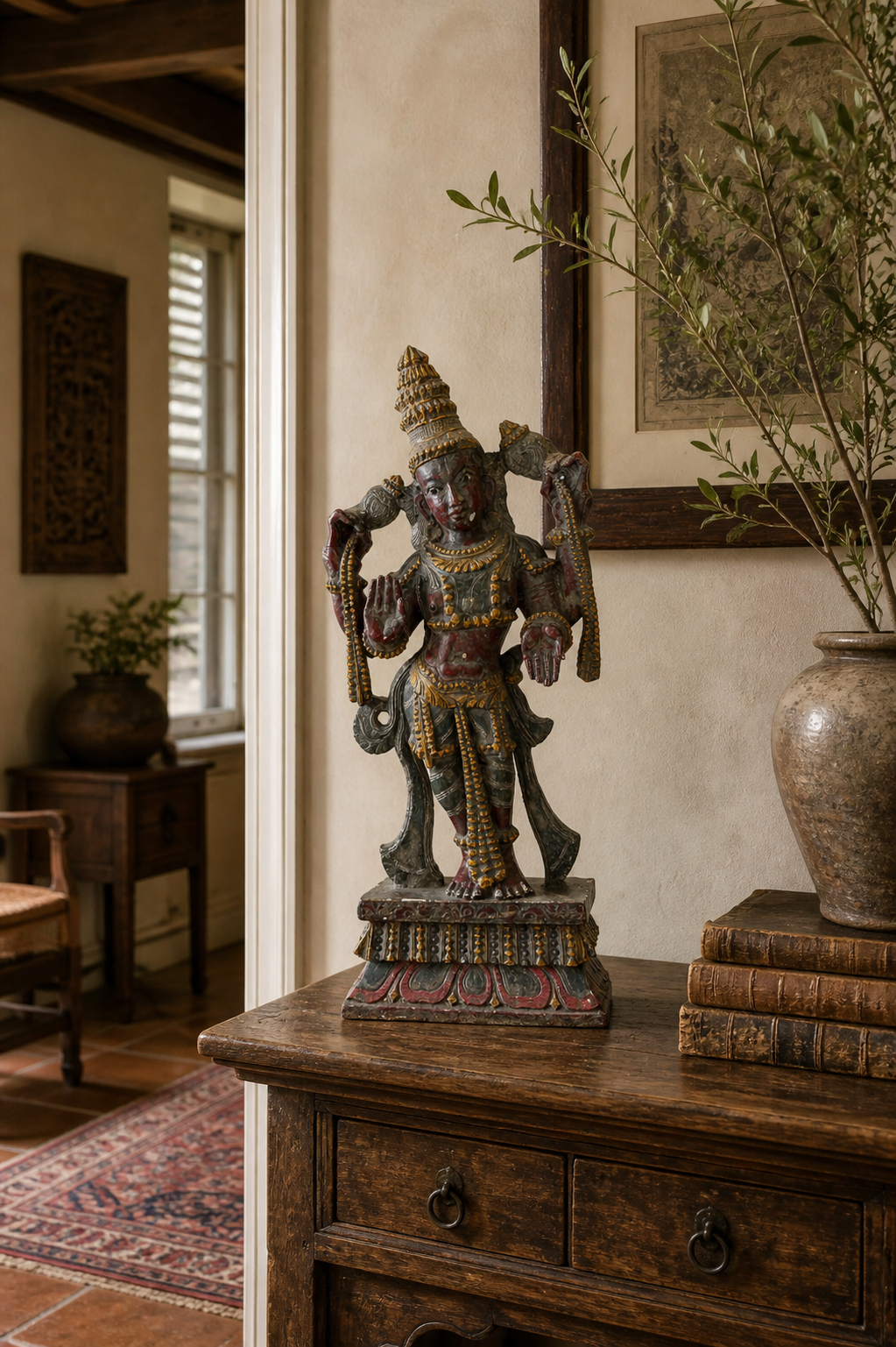 Antique wooden statue of the Hindu god Vishnu from South India