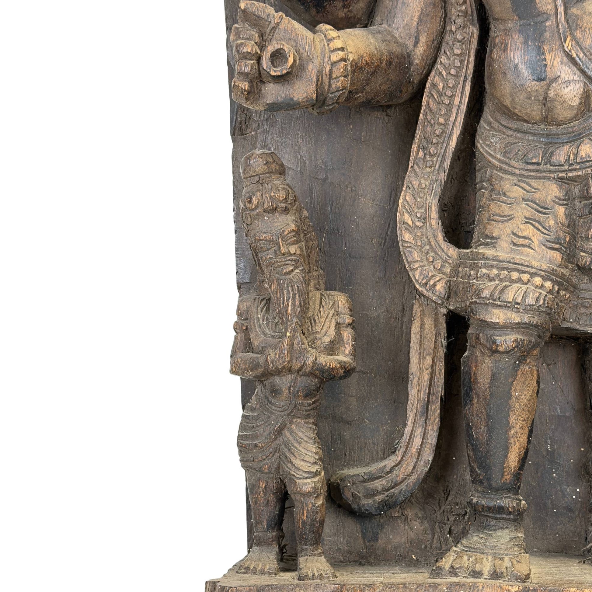 Indian temple relief with a multi-armed Ardhanarishvara depiction