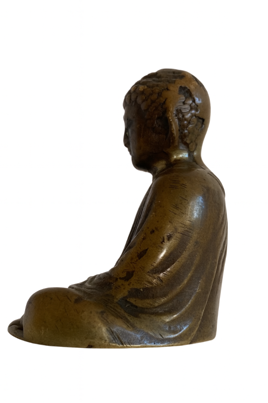 Japanese bronze Buddha statue in a seated meditation posture