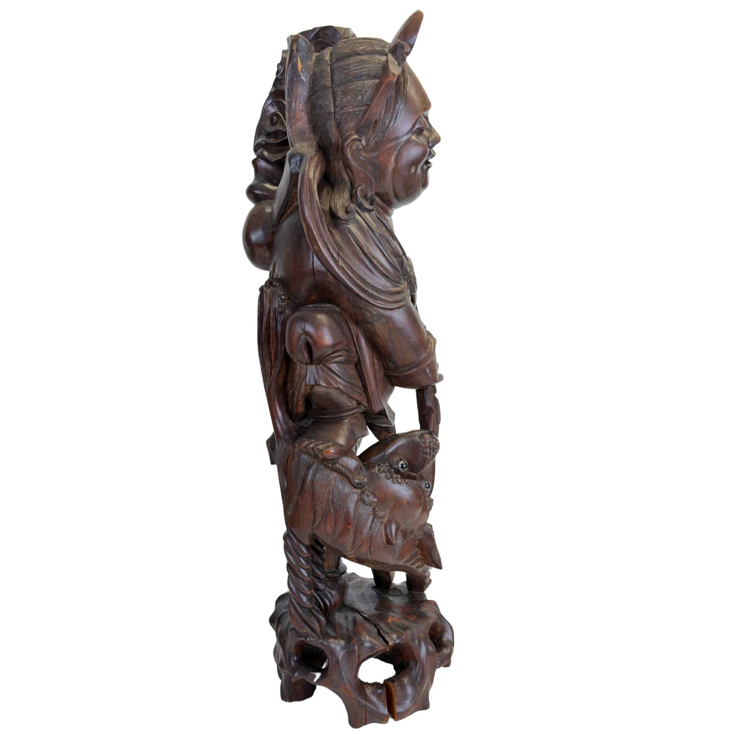 Detailed wooden statue of the Japanese god Ebisu with a fish