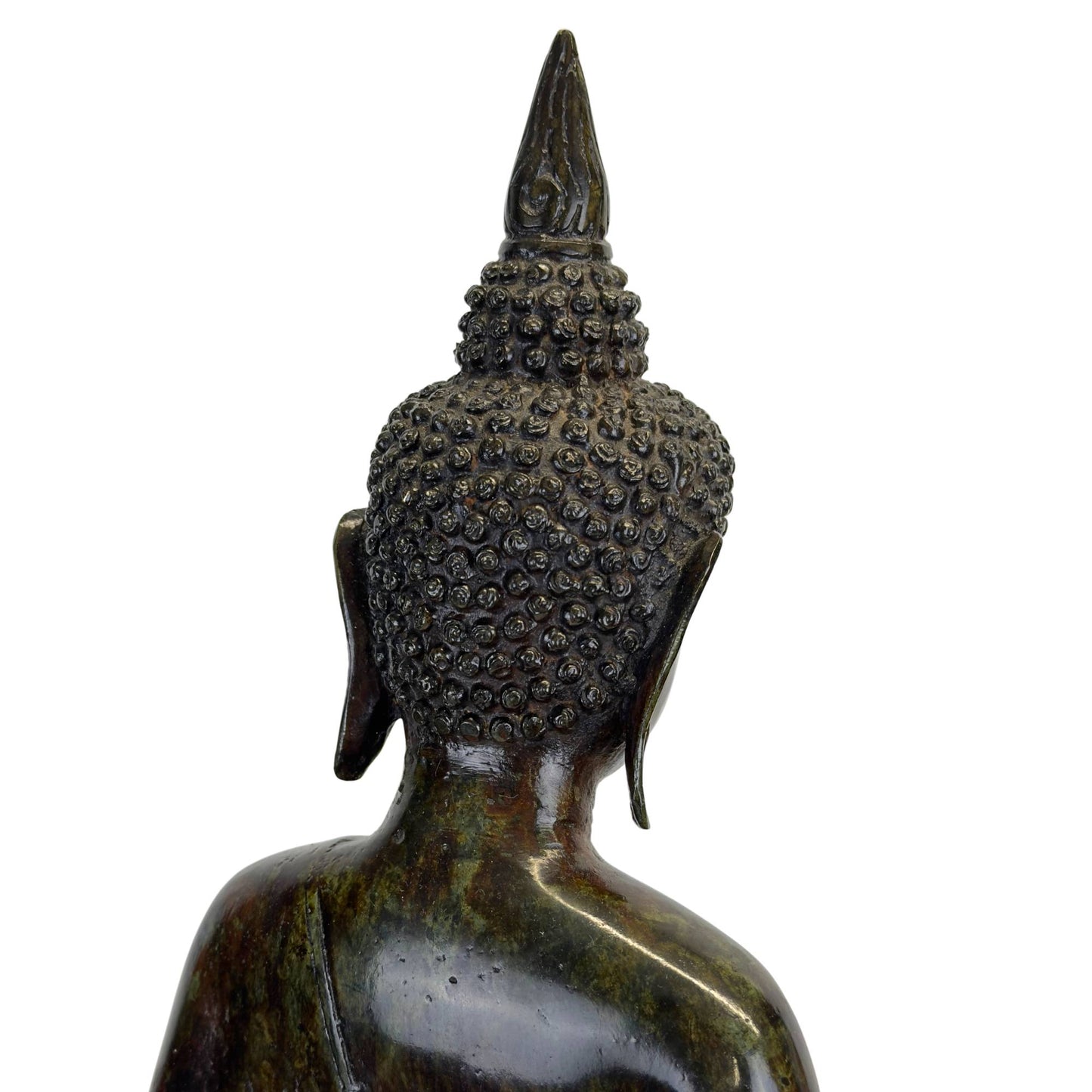 Detailopname van de kruin en de klassieke Javanese haardracht met restanten van prada.