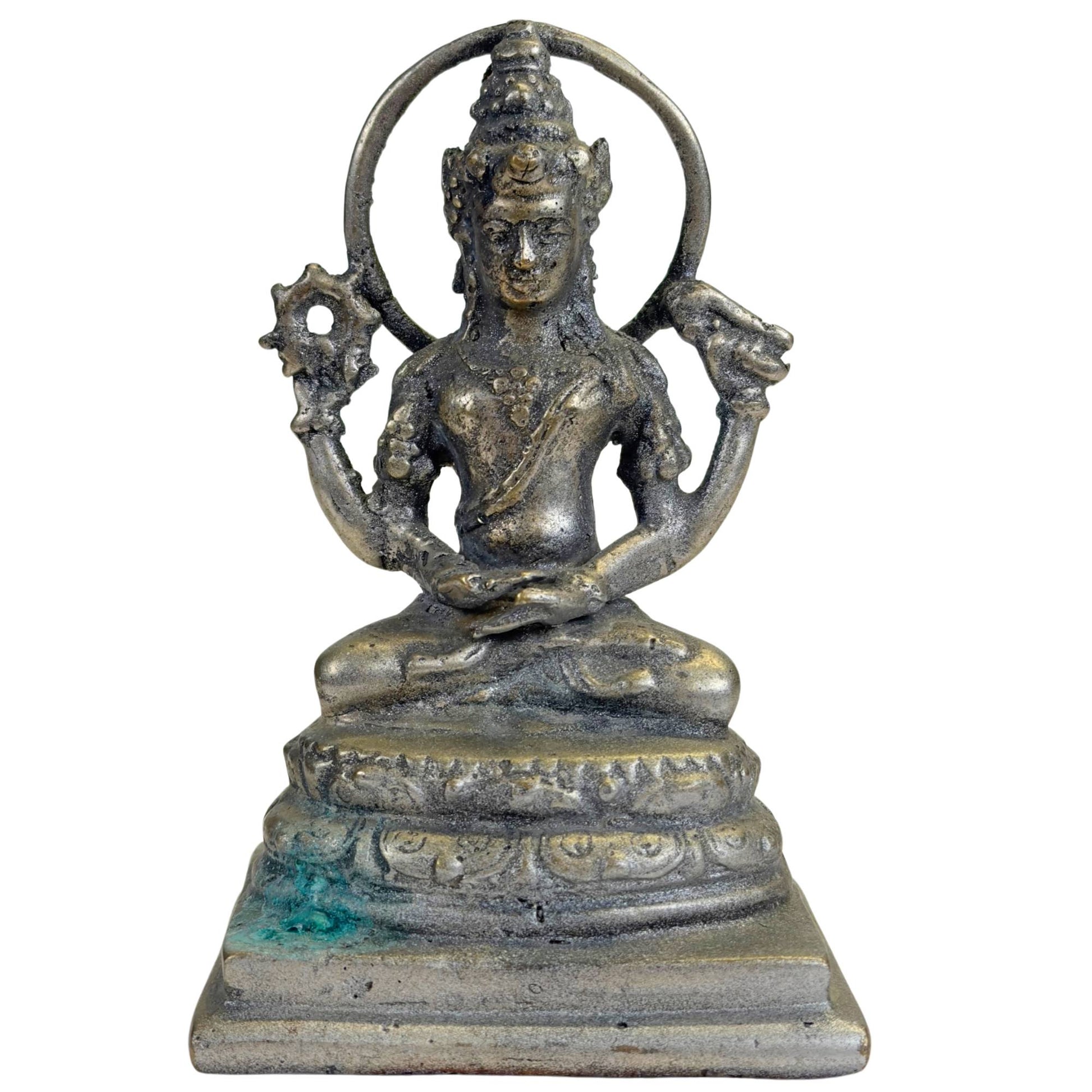 Old Javanese bronze Vishnu statue from Indonesia with four arms, chakra, shell, and round halo
