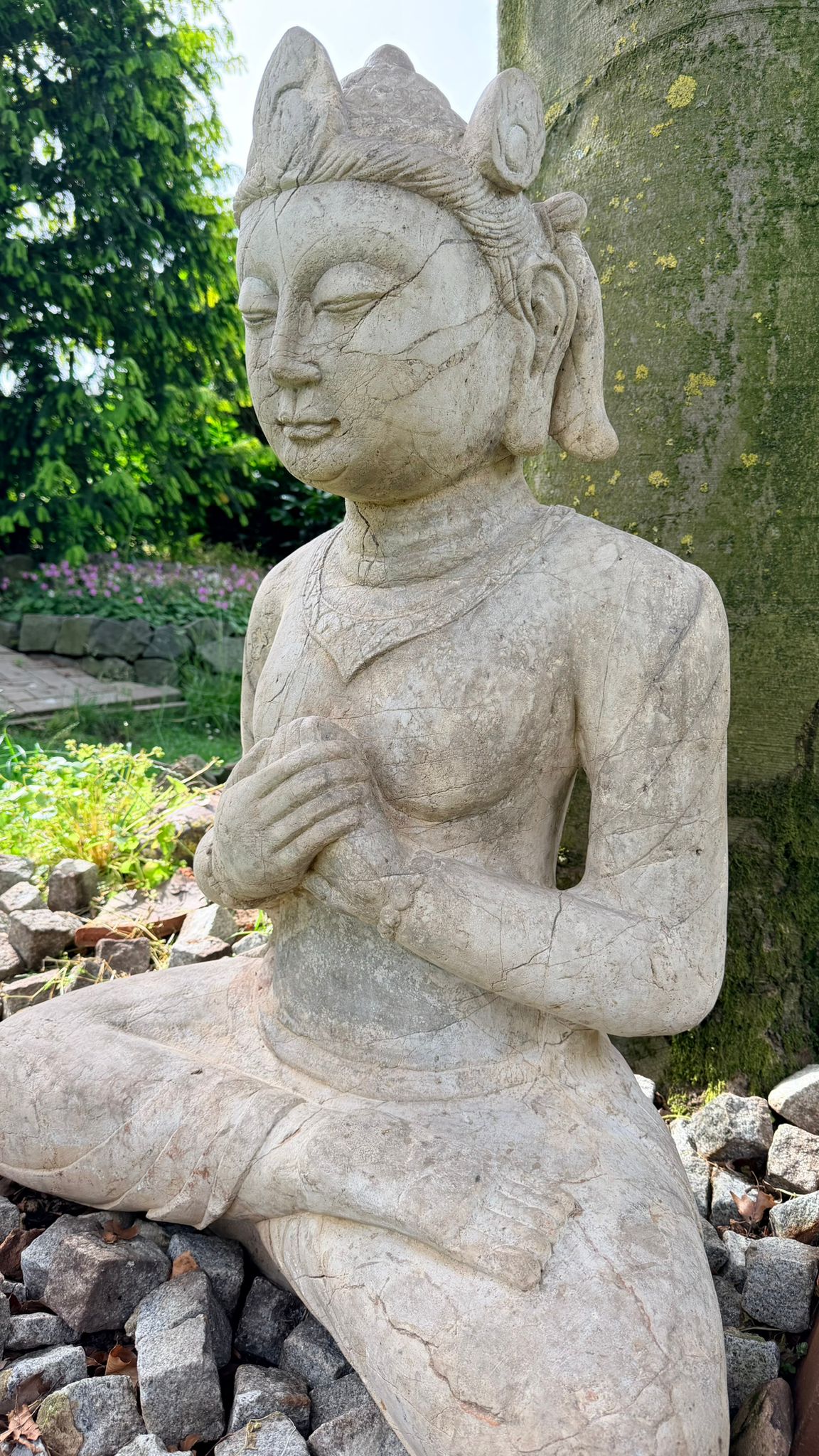 Javanese temple figure made of solid natural stone with an authentic appearance