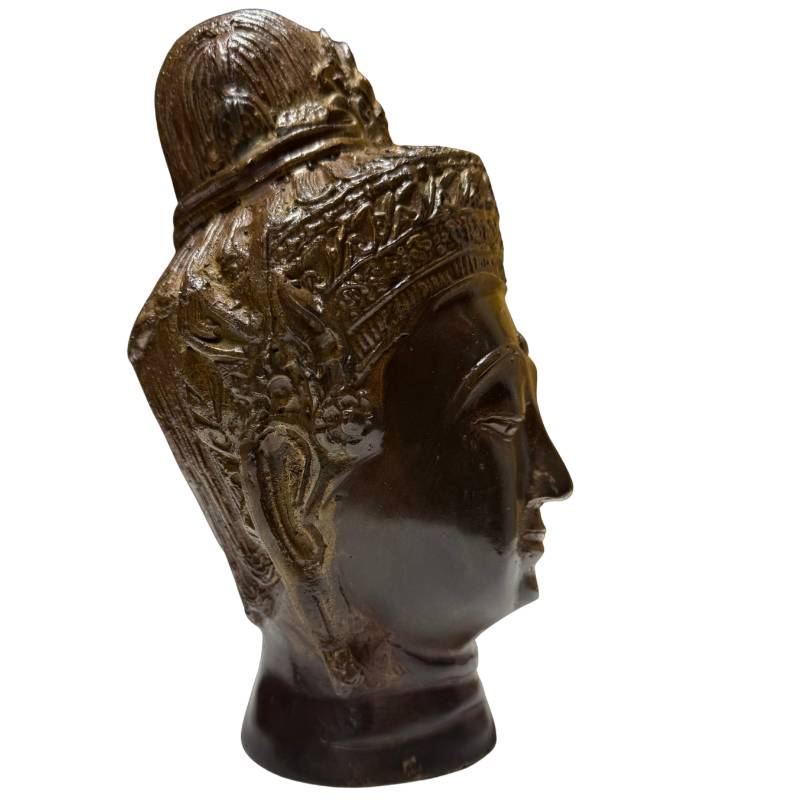 Khmer style Buddha head with a serene appearance and spiritual significance