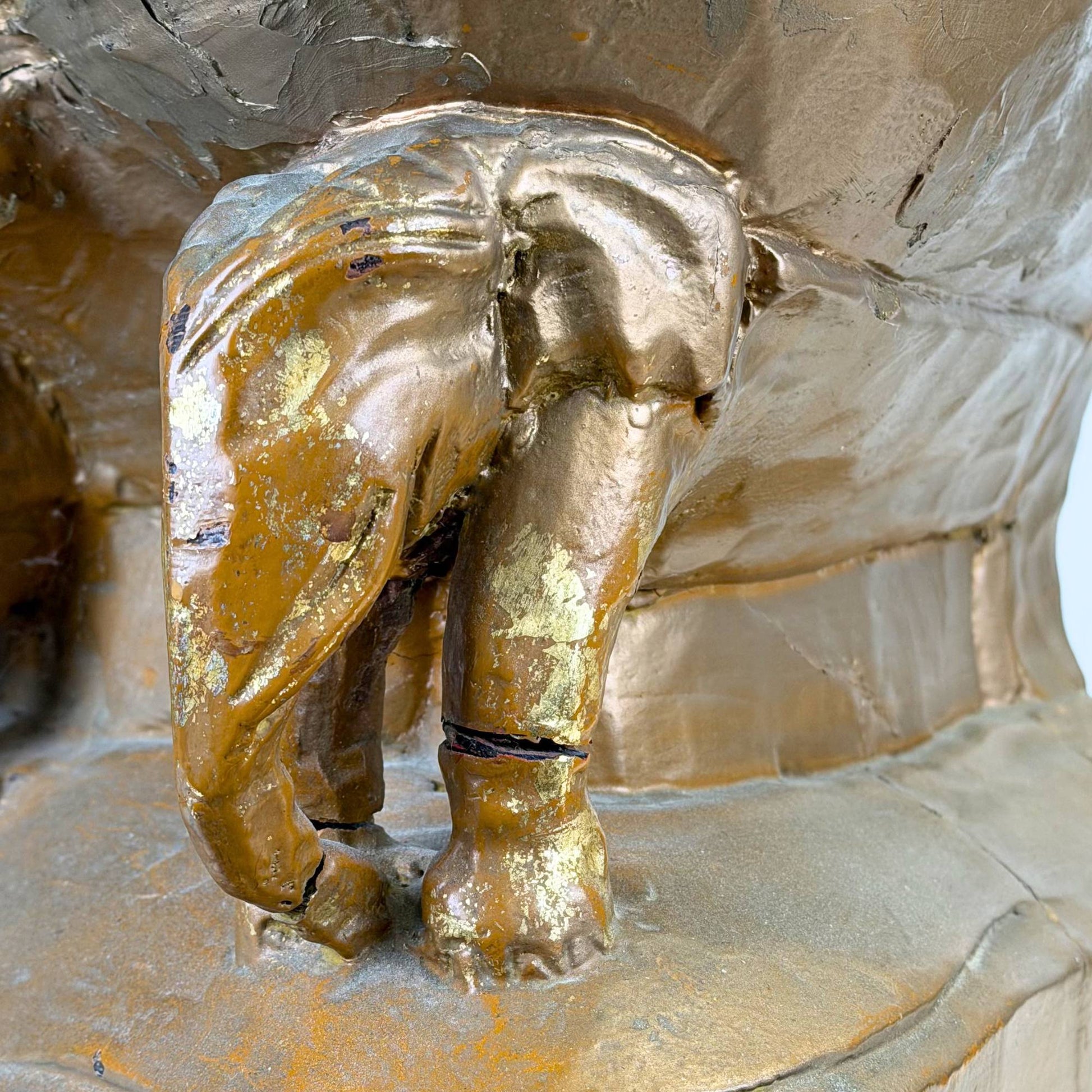 Large antique Burmese Buddha with richly gilded robe and decorative elephant throne