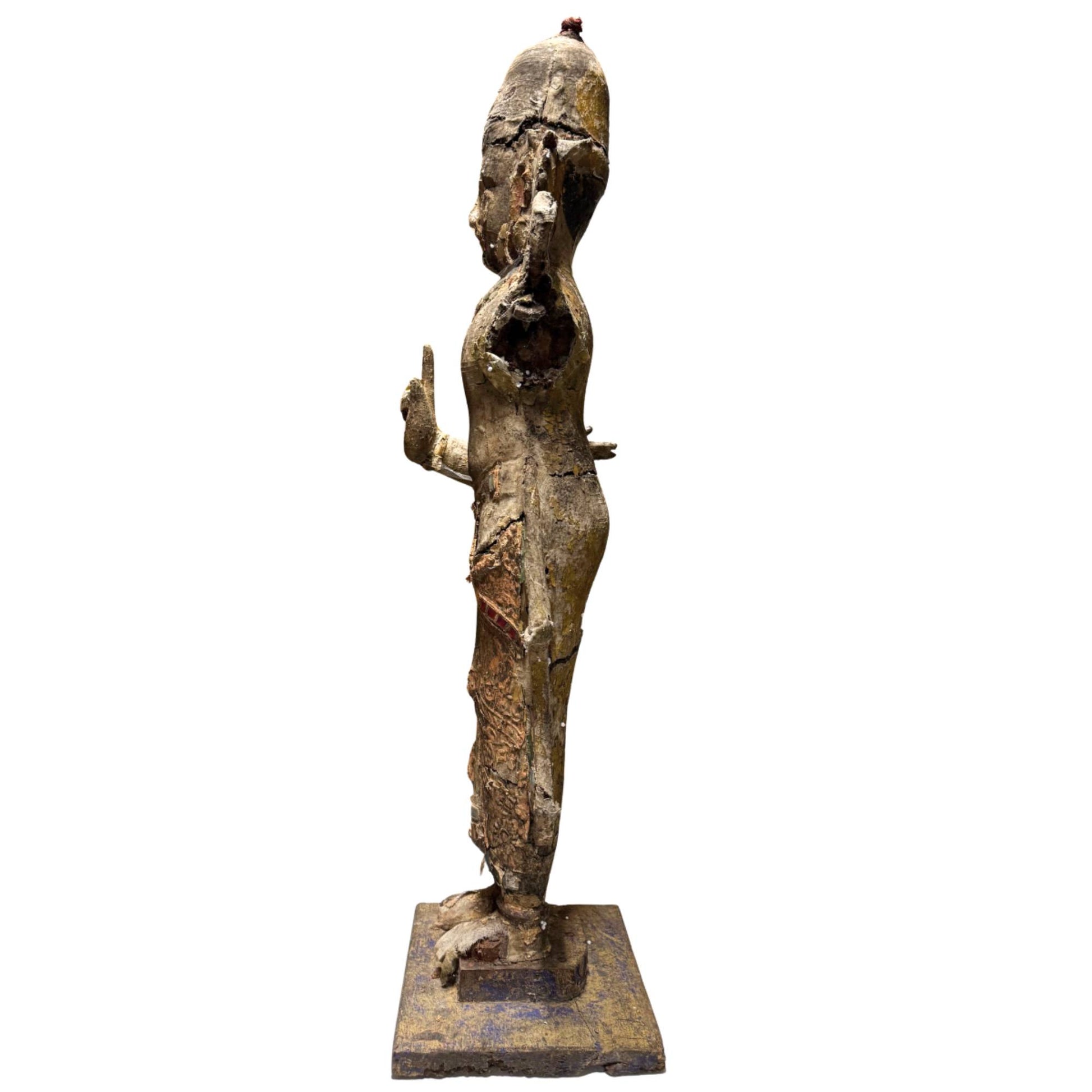 Krishna temple statue from the 18th to 19th century with deep signs of age
