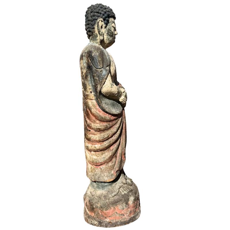 Kwan Yin statue with remnants of polychrome painting
