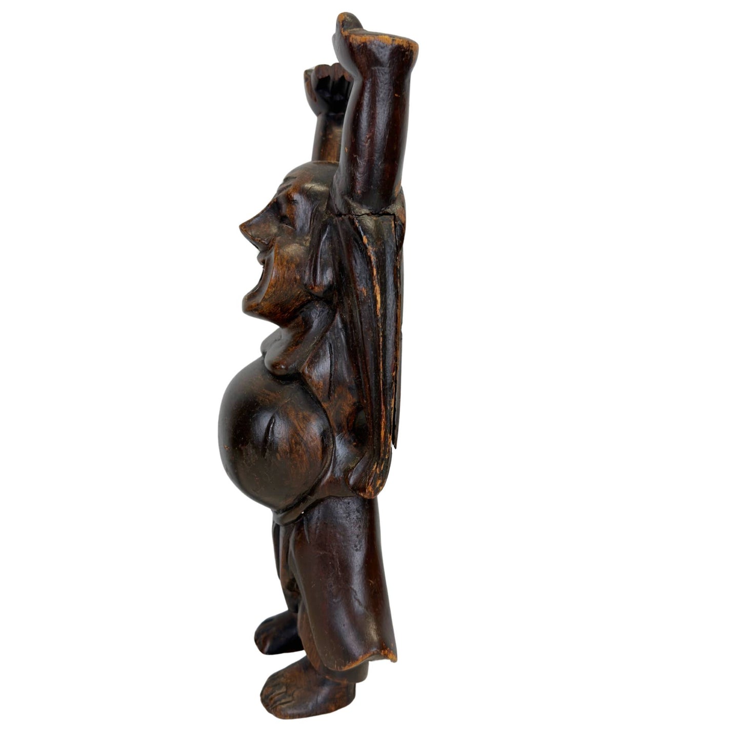 Laughing Buddha made of wood from the Southeast Asian Chinese diaspora with a folk art-like carving style.