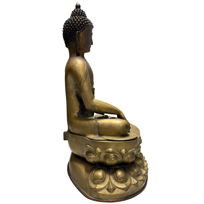 Large bronze Buddha temple statue from Ladakh with remnants of gilding