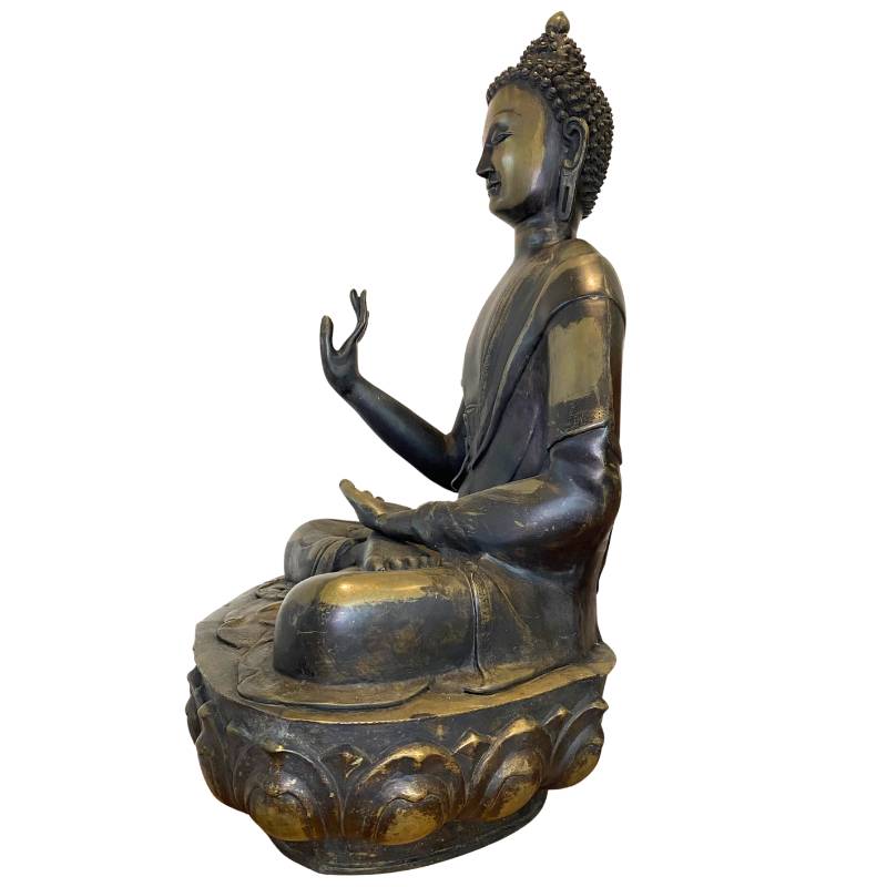 Fire-gilded Ladakh Buddha in bronze from the 18th century as a temple statue