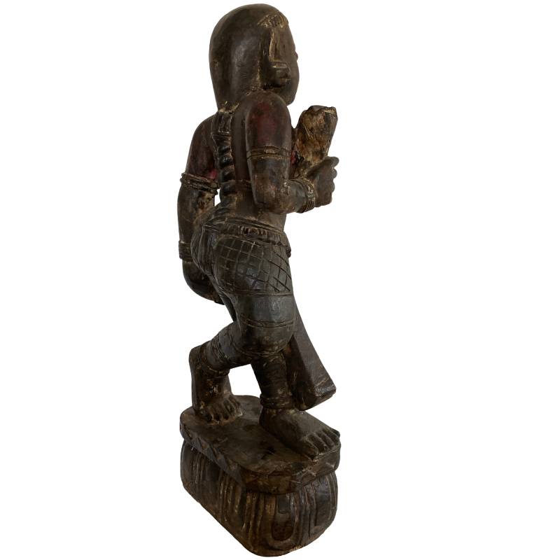 Wooden Lakshmi statue from Nepal with crackle paint and deep patina on the surface