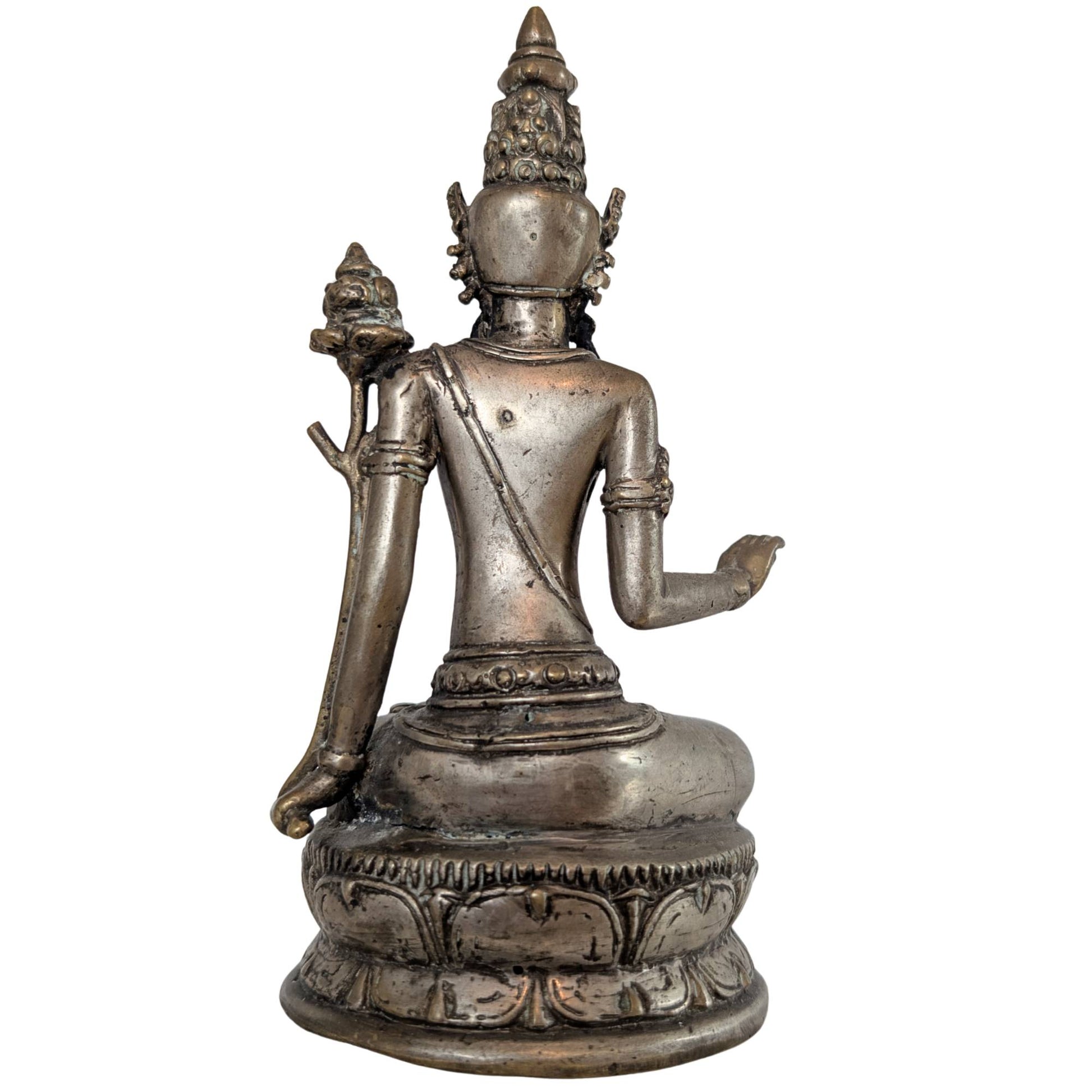 Left side view with a focus on the symbolic lotus flower and the meditative posture.