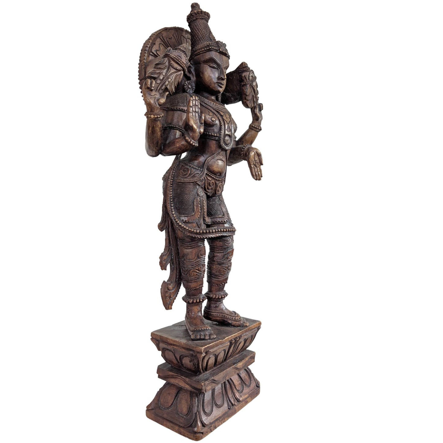 Vishnu depicted with the Shanka conch and Chakra discus.