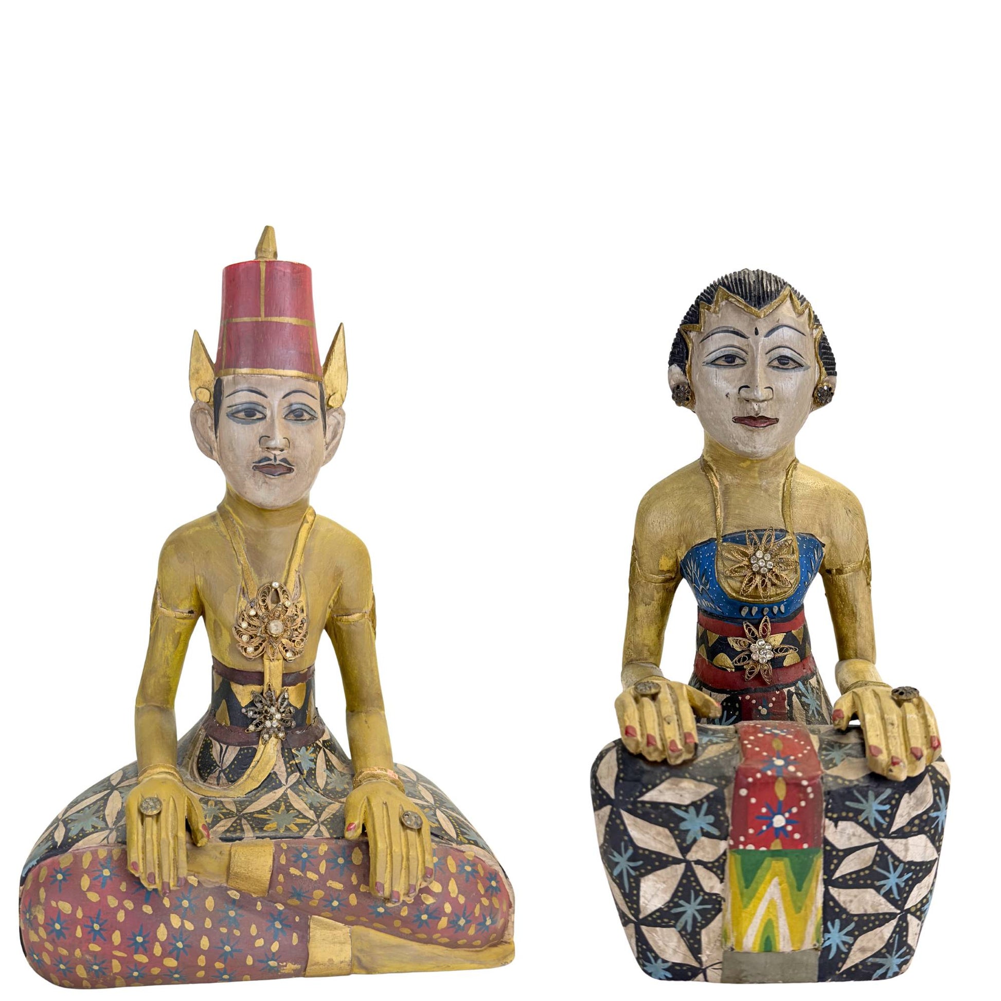 Antique Javanese Loro Blonyo wedding statues made of hand-carved wood.