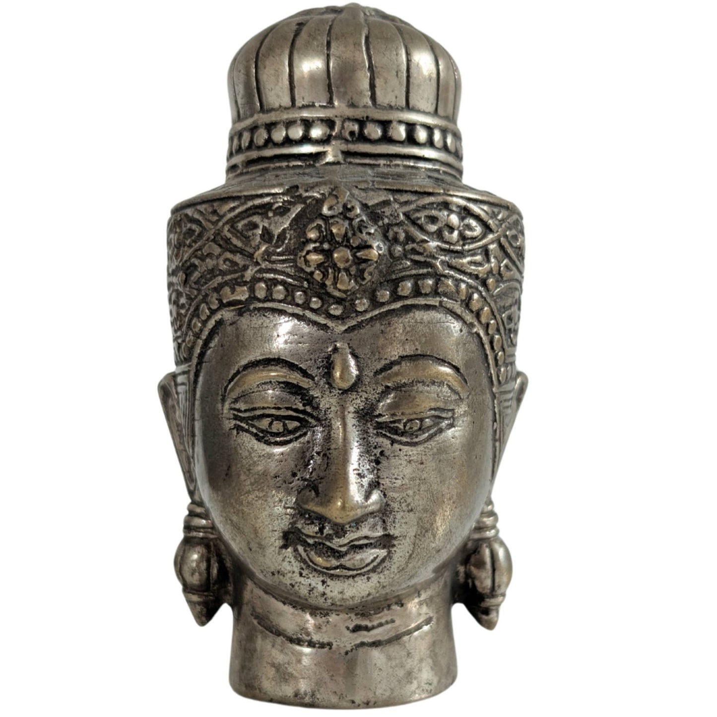 Front view of a heavy solid bronze Buddha head with silver plating.
