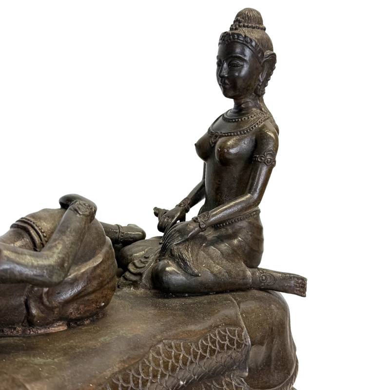Solid cast brass statue with dark patina