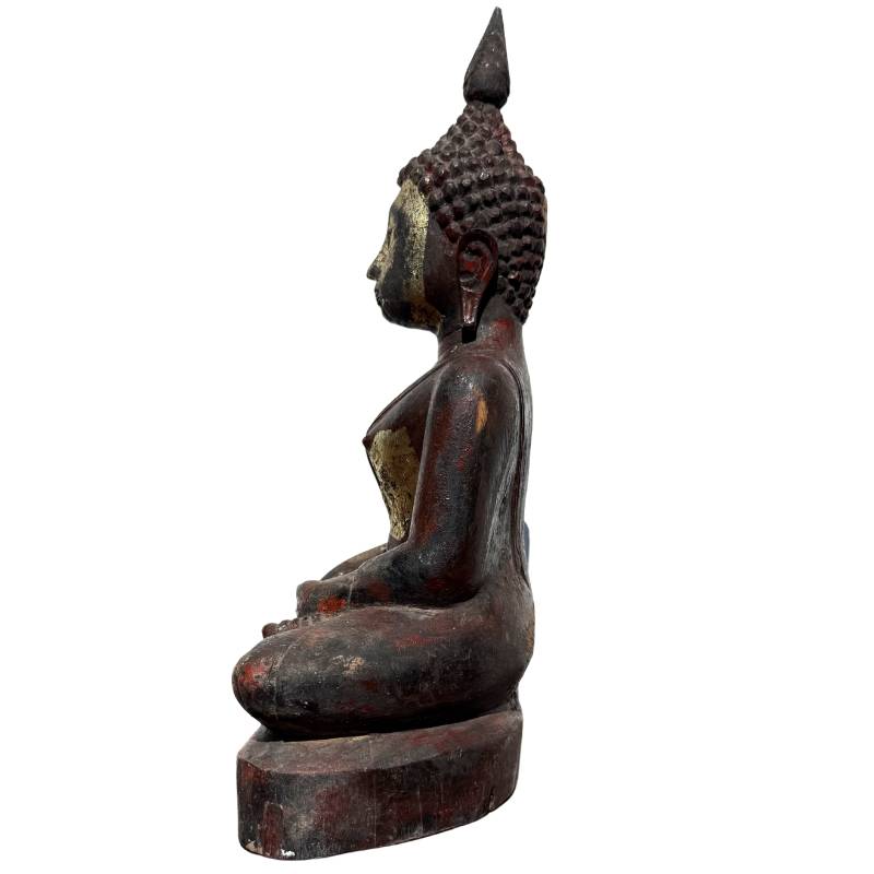 Solid teak Buddha with gold leaf patina.