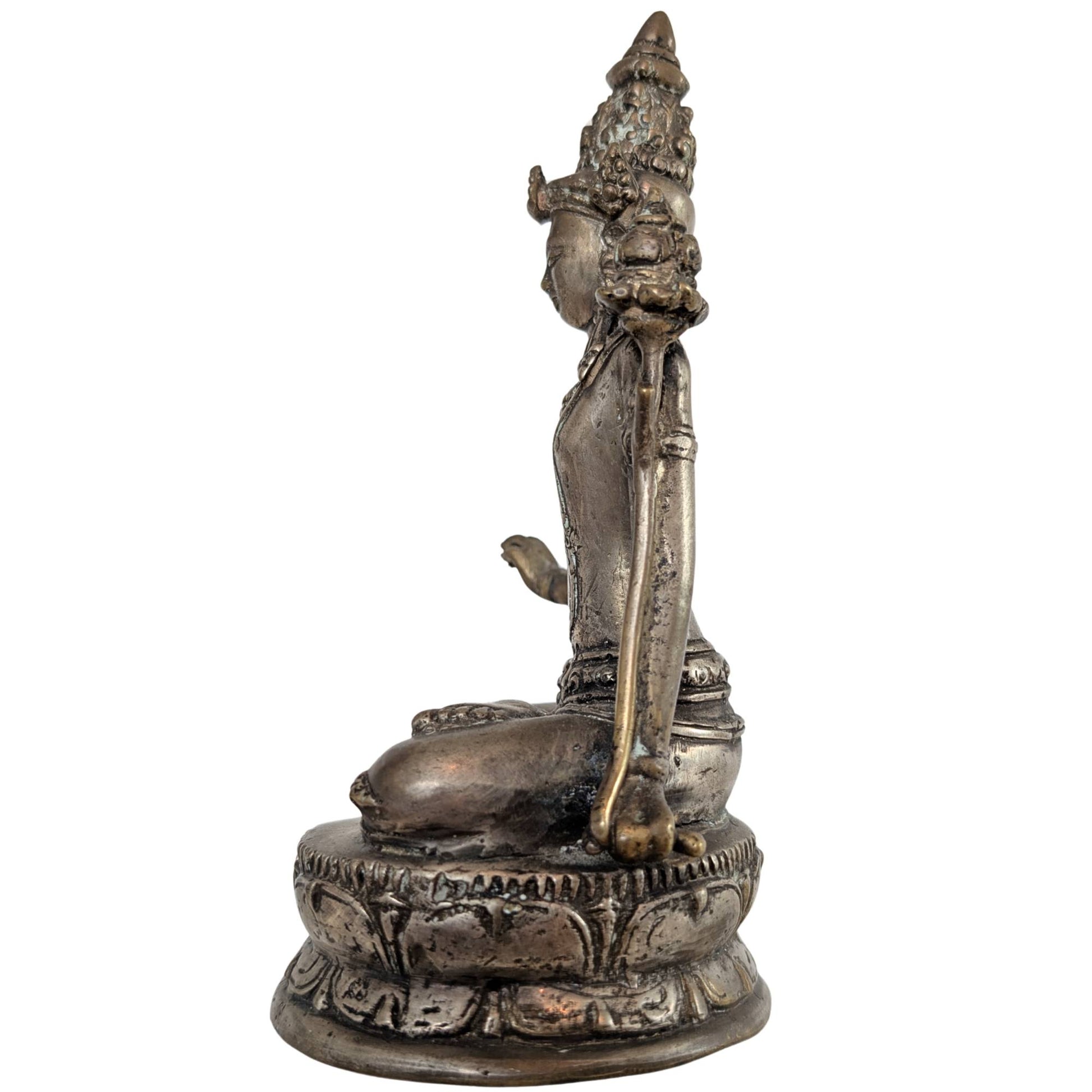 Right profile of the Padmapani with a focus on the crown and the serene facial features.