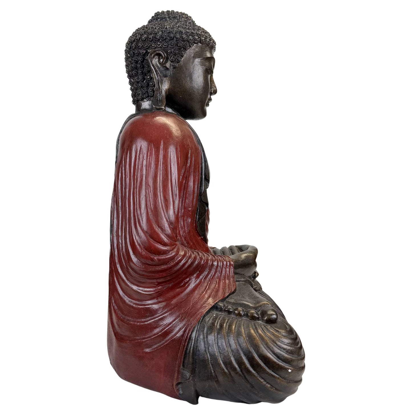 Decorative resin Buddha statue in a meditation pose for Zen interiors and spiritual spaces
