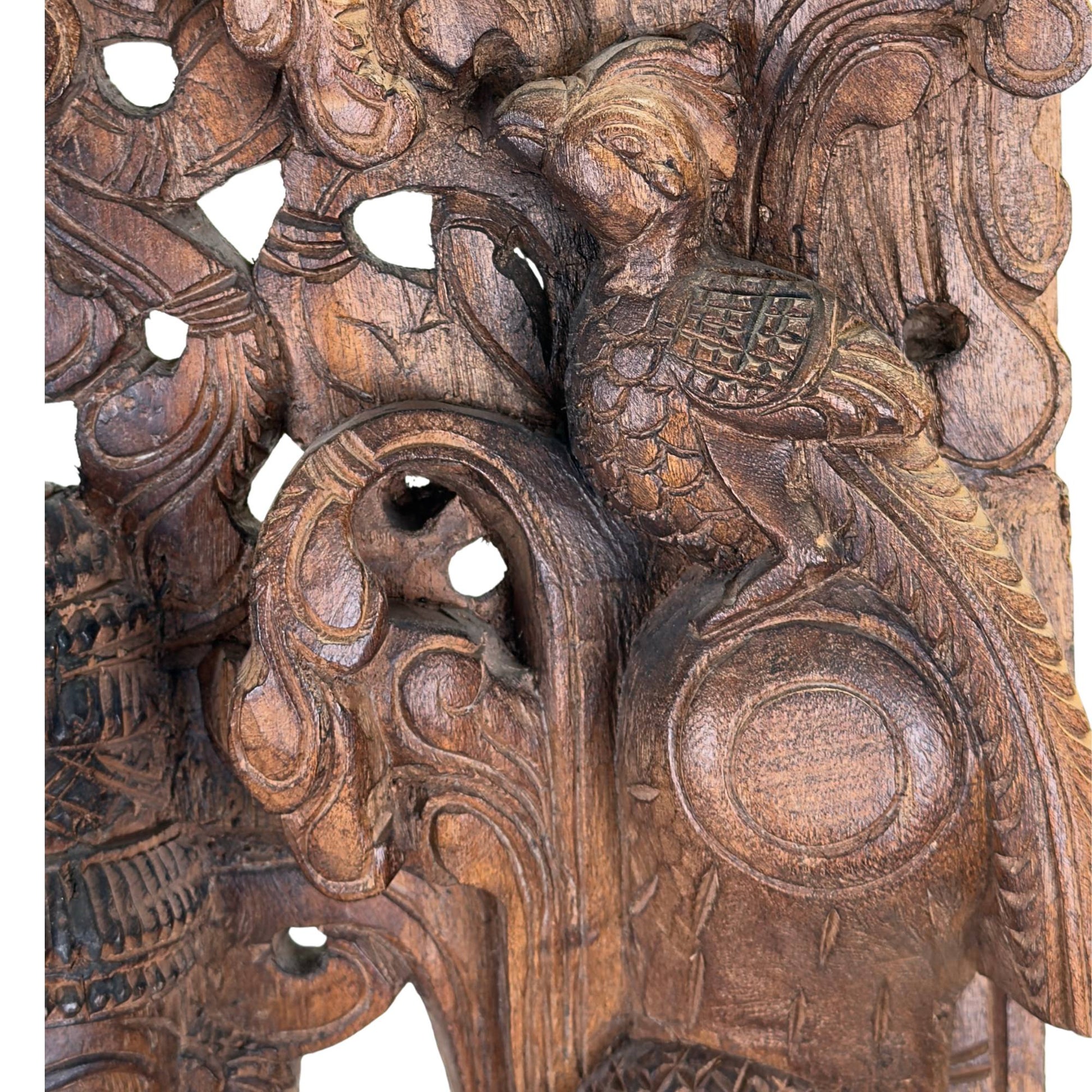 Close-up of the detailed, conical crown that symbolizes Meenakshi's status as queen