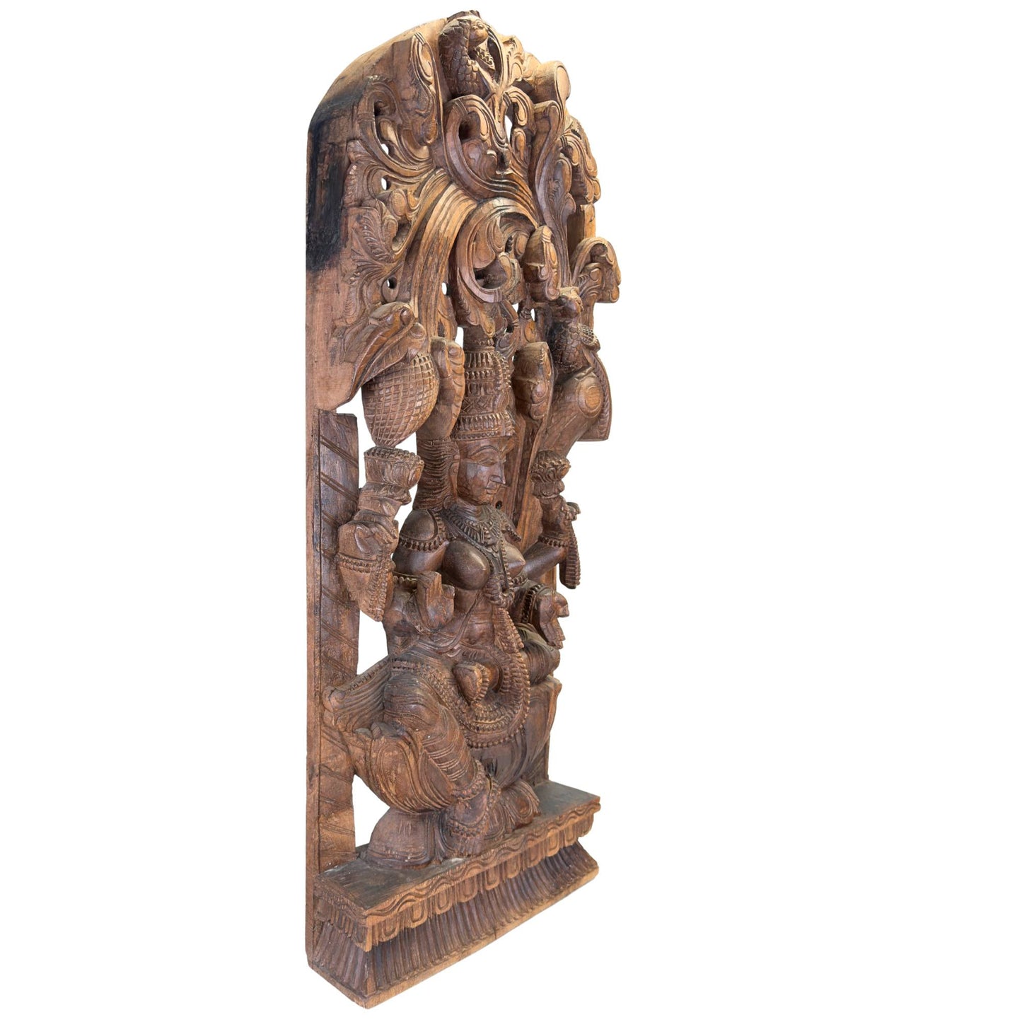 Detail of the lotus flowers in the back hands of the goddess, a symbol of purity and spiritual awakening