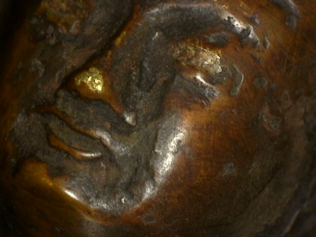 Microscope detail of Himalayan bronze Buddha with Dhyana Mudra and natural patina buildup