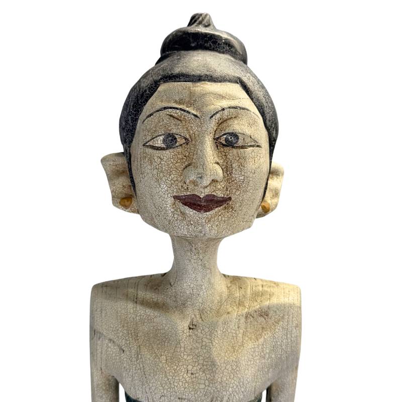 Mid-century modernist influences in classical Javanese woodcarving.