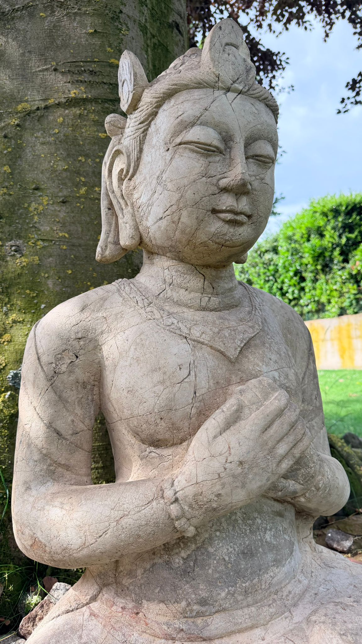 Monumental Asian temple statue made of natural stone for garden or interior