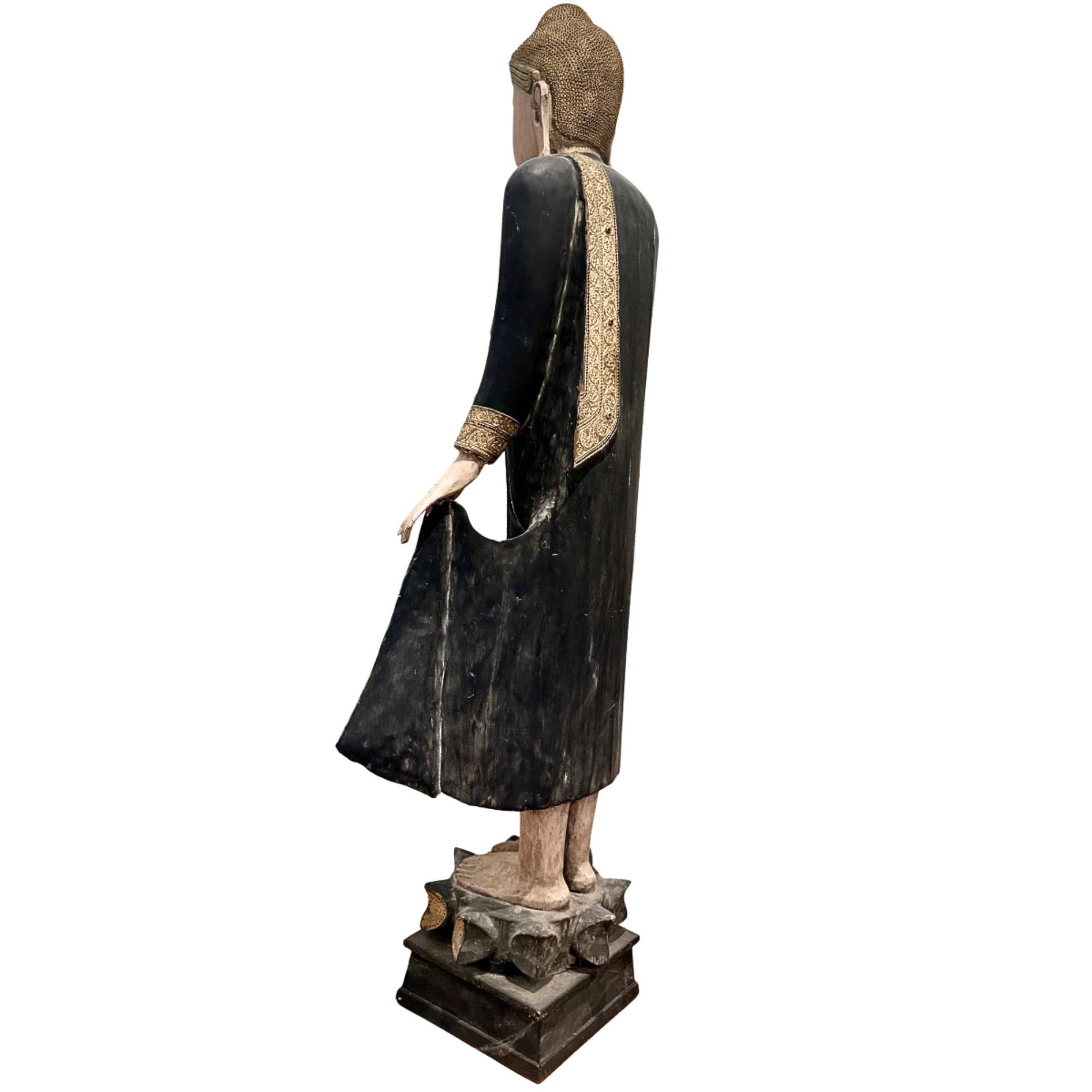 Monumental Buddha statue from Myanmar, antique standing Buddha of 190 cm with a serene facial expression